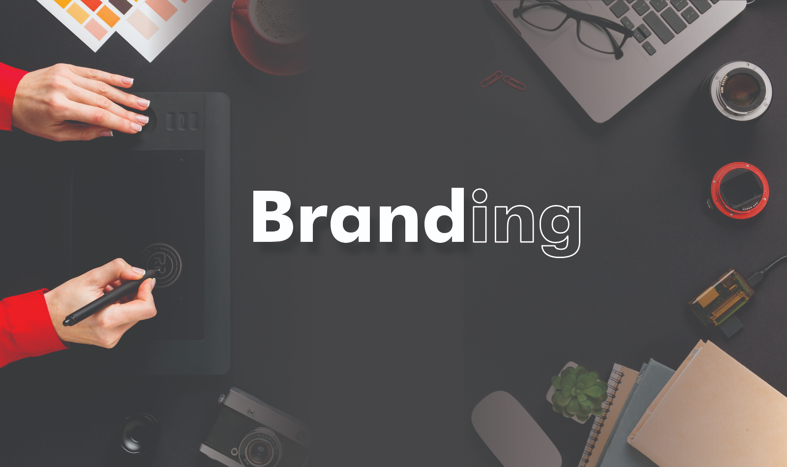 Creative workspace with branding focus